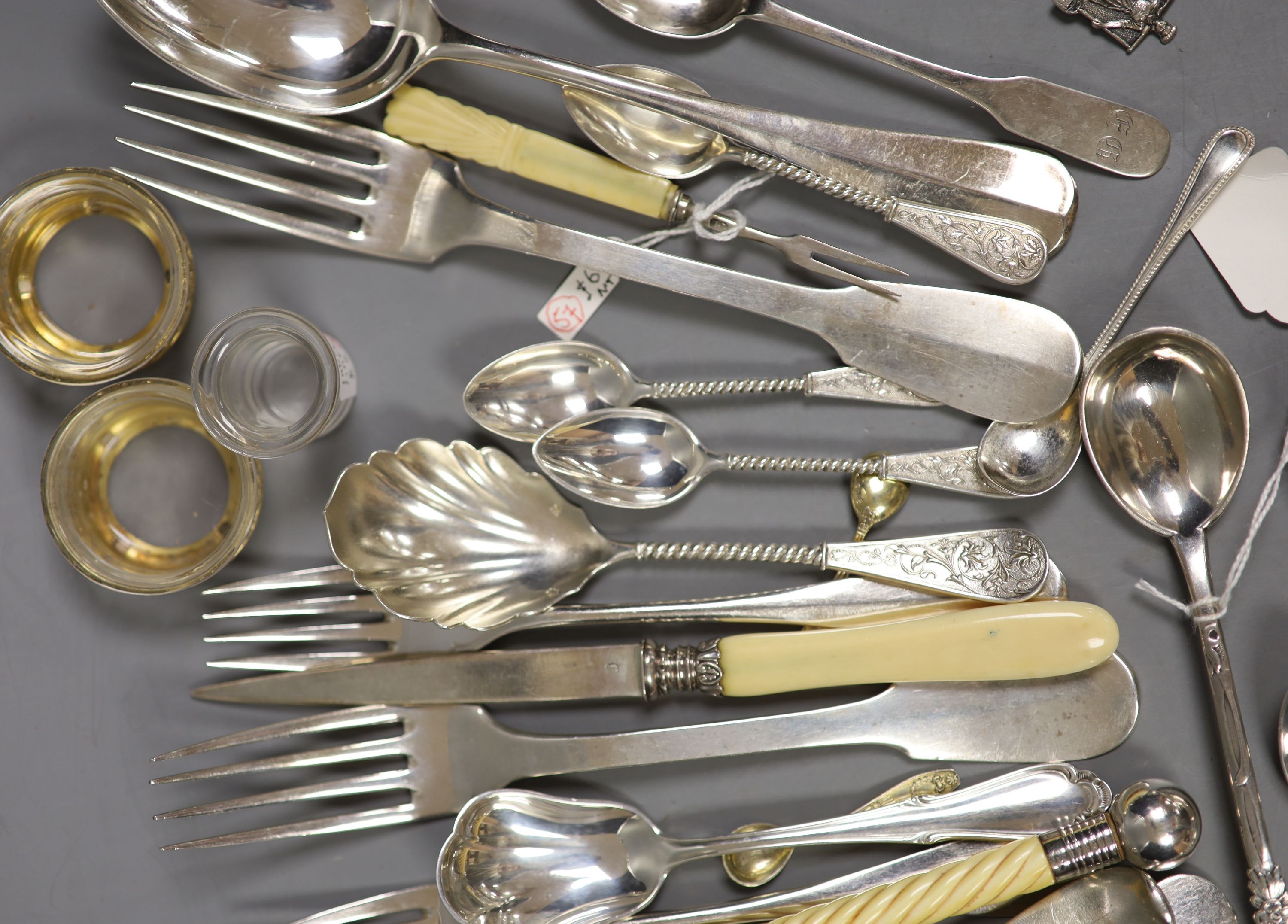 A pair of German 800 gilt white metal salts and a quantity of continental white metal flatware including French, Dutch and Austro-Hungarian, weighable white metal 13oz and a group of plated flatware.